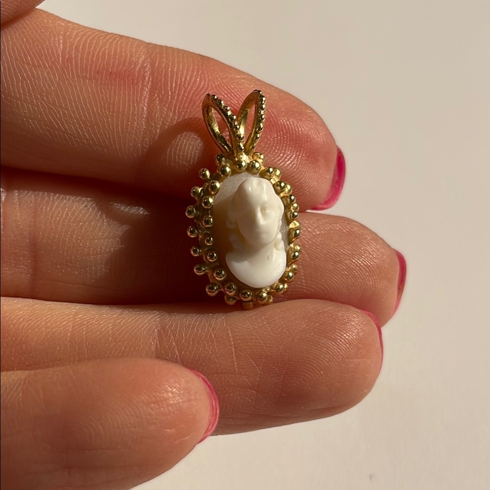 Elegant Gold and White Cameo Pendant